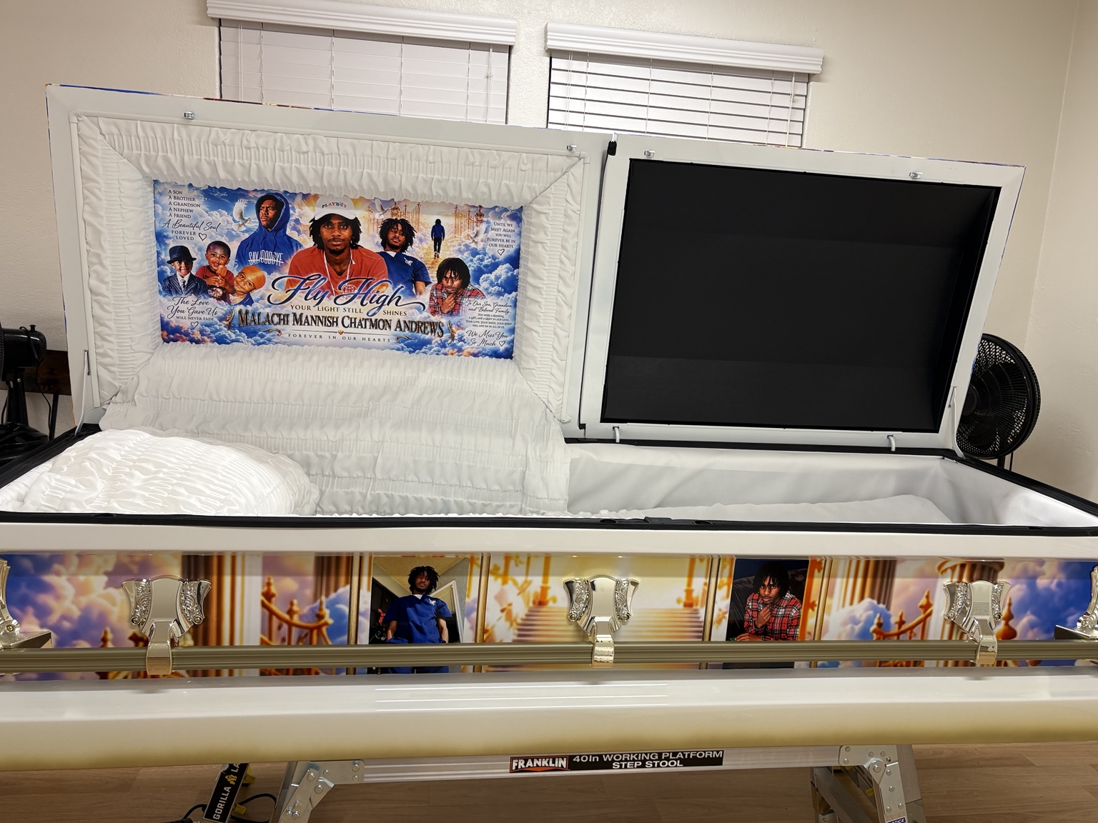 Personalized memorial casket insert installed in casket